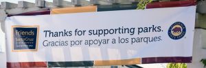 a banner that reads "Thanks for Supporting parks. Gracias for apoyar a los parques."