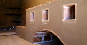 a clay and brick oven in the Castro Adobe