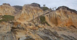 a rocky staircase up a sea cliff