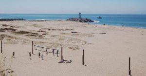 Lighthouse and volleyball net at Seabright beach