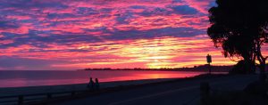 Bright pink sunset over the ocean