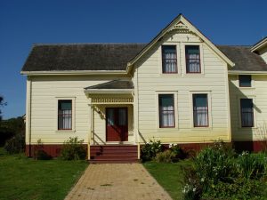 White wood paneled house