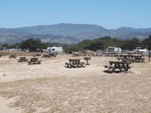 Picnic tables on the sand