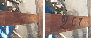wooden supports with 207 written on them